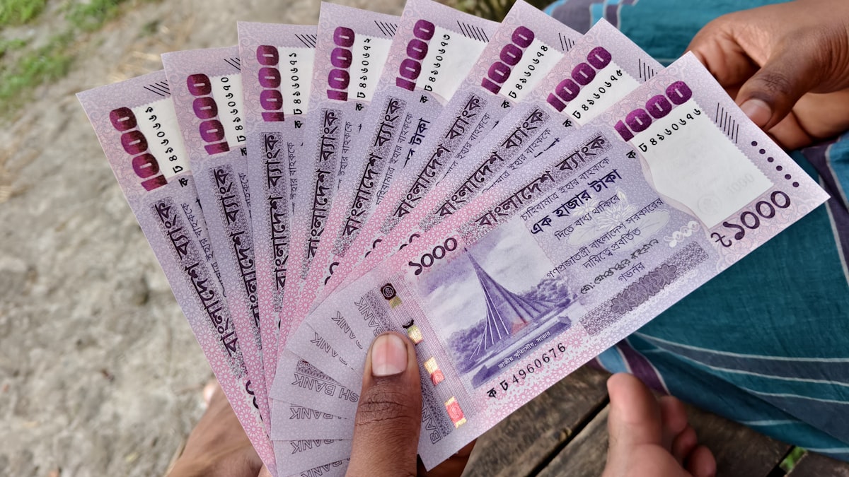 Bangladeshi taka banknotes representing bKash payment settlement